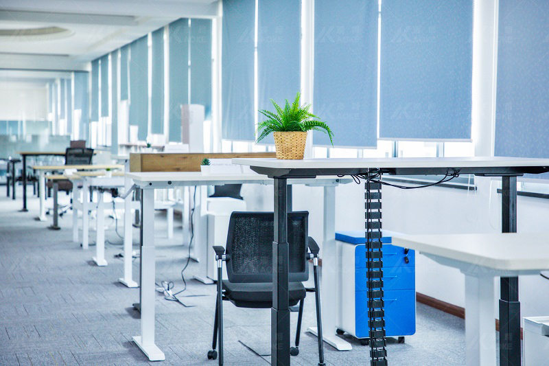 Sit stand desk and accessories in sample room