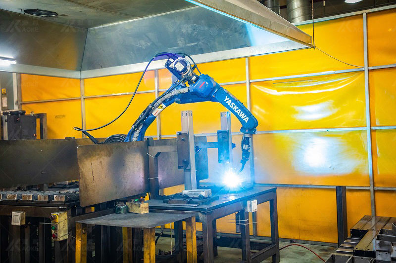 The laser machine is welding stand up desk frame parts